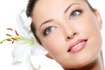 Healthy Skin Of Beautiful Woman Face With A Flower
